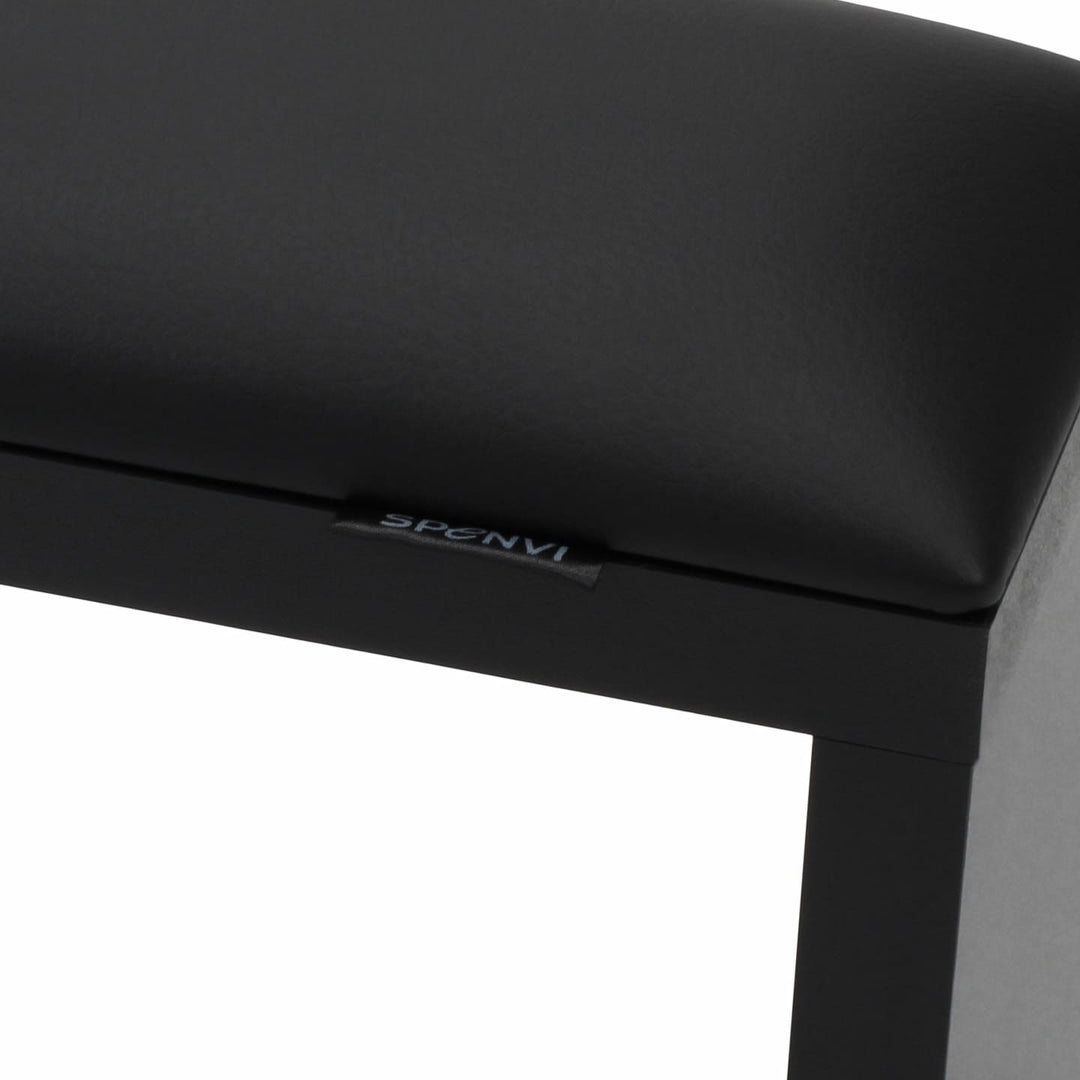 Close-up of SPENVI Classic manicure arm rest with black leather cushion and black-finish wooden base.