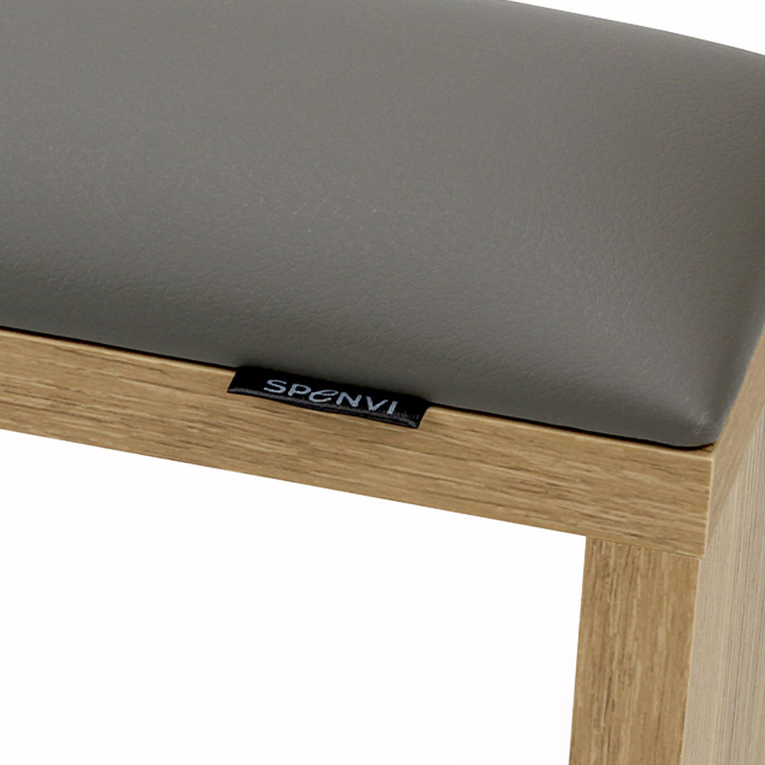 Close-up of SPENVI Classic manicure arm rest with gray leather cushion and oak-finish wooden base. #color_gray