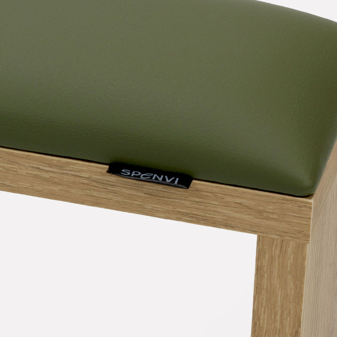 Close-up of SPENVI Classic manicure arm rest with khaki leather cushion and oak-finish wooden base. #color_khaki