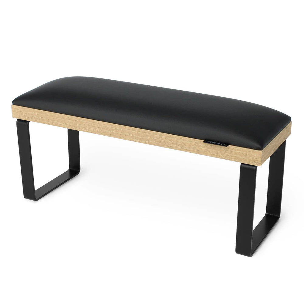 SPENVI Loft manicure arm rest with black leather, oak-finish base, and black metal legs on white background. #color_black