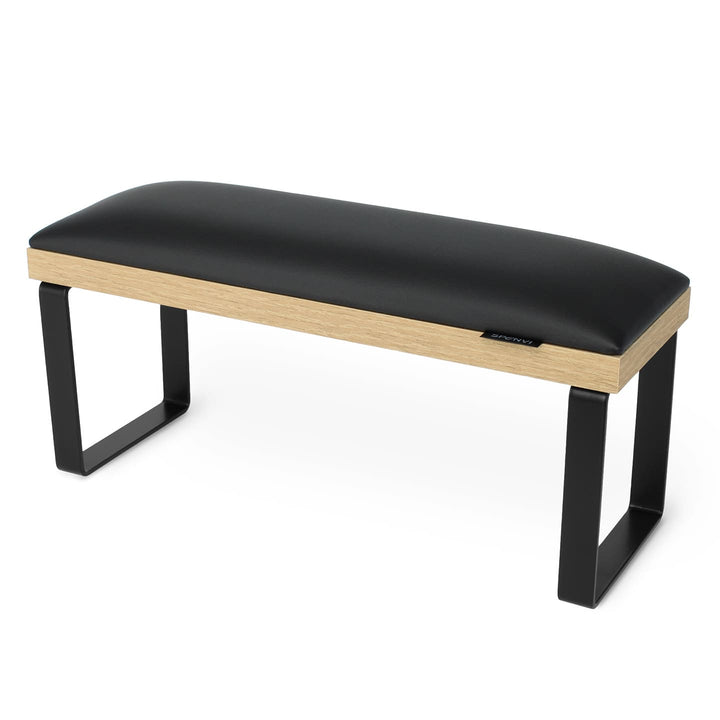 SPENVI Loft manicure arm rest with black leather, oak-finish base, and black metal legs on white background. #color_black