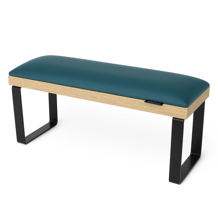 SPENVI Loft manicure arm rest with dark green leather, oak-finish base, and black metal legs on white background. #color_dark-green