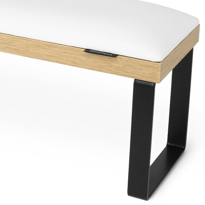 Side view of SPENVI Loft arm rest showing smooth white leather cushion, oak-finish base, and black metal legs. #color_white