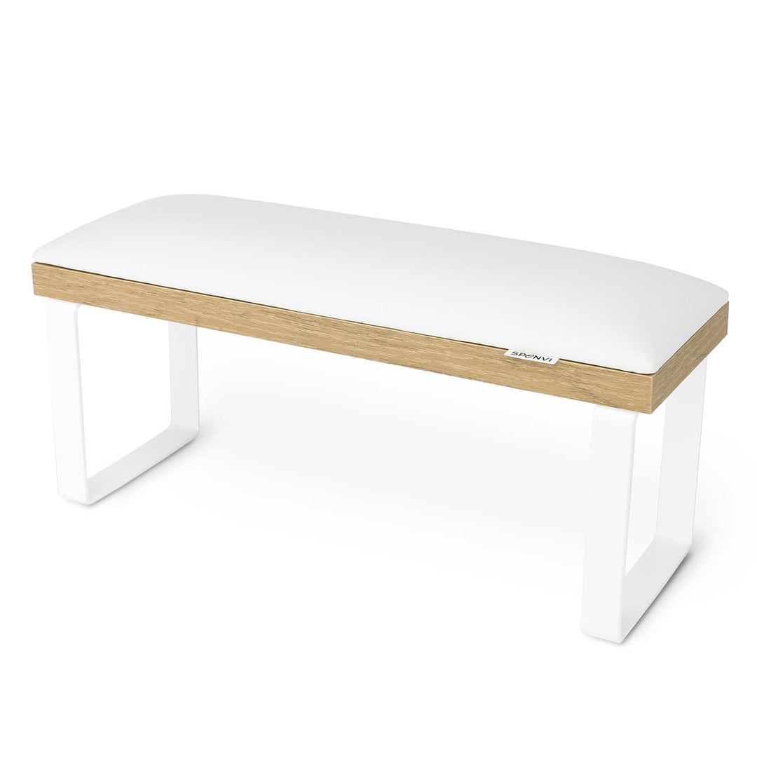 SPENVI Loft manicure arm rest with white leather cushion, oak-finish base, and white metal legs on white background.