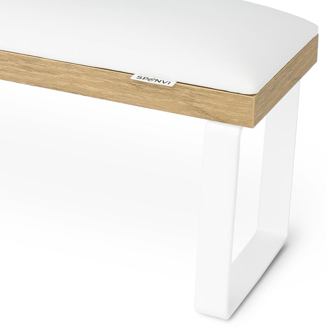 Side view of SPENVI Loft arm rest showing smooth white leather cushion, oak-finish base, and white metal legs.