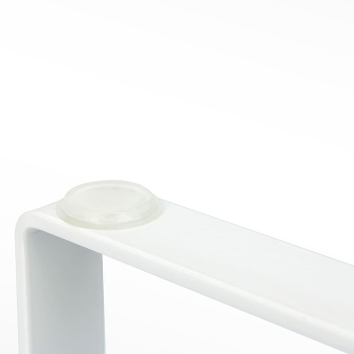 Detail of SPENVI Loft manicure arm rest leg with non-slip rubber foot cap in white.