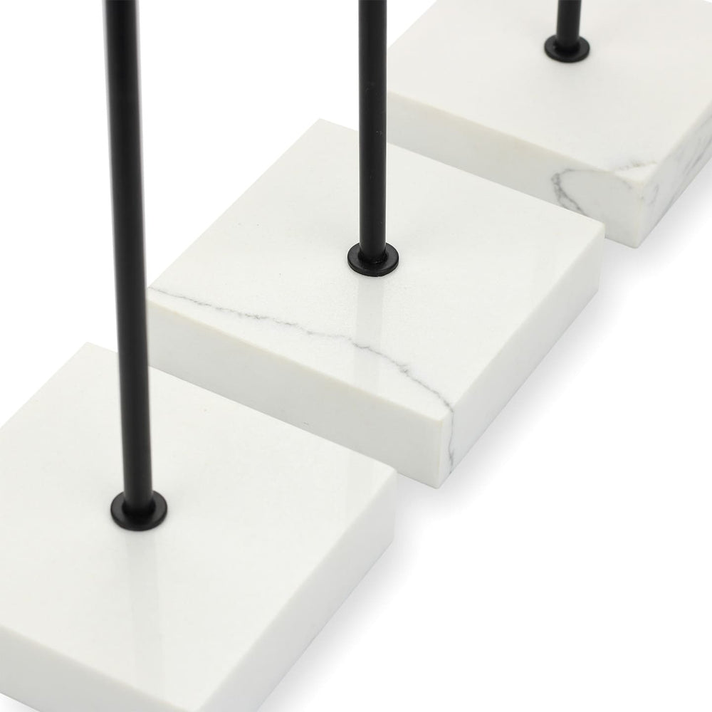 Close-up of SPENVI Nail Swatch Display Stand showing smooth black metal holder and marble base texture. #color_black