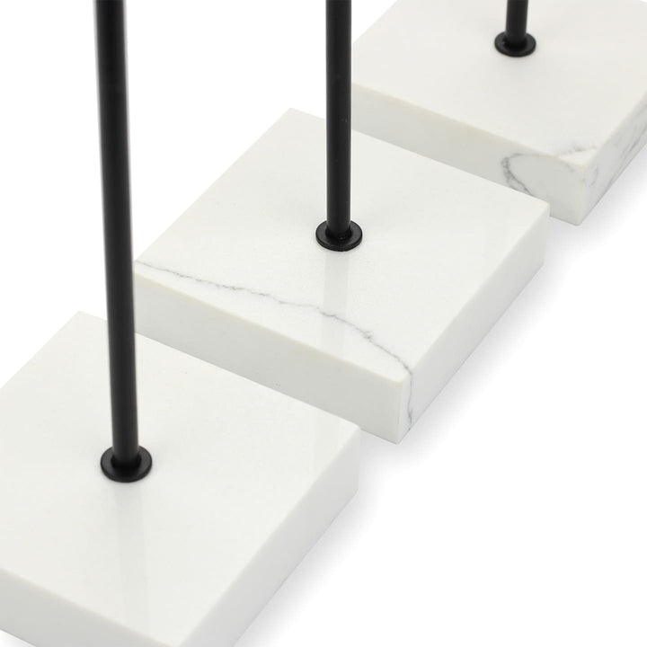 Close-up of SPENVI Nail Swatch Display Stand showing smooth black metal holder and marble base texture. #color_black
