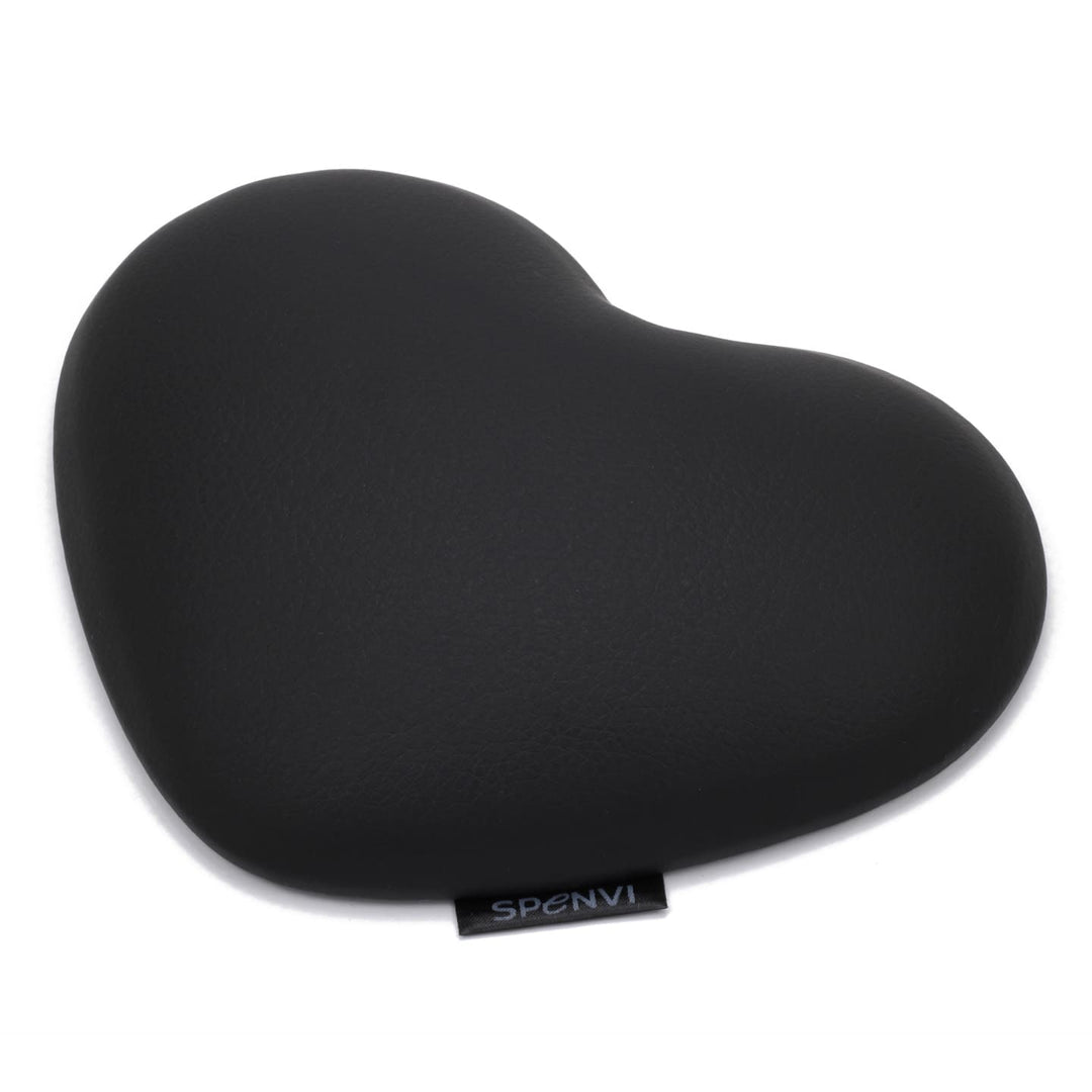 Black heart-shaped SPENVI nail tech elbow cushion made of soft leather on a clean white background. #color_black