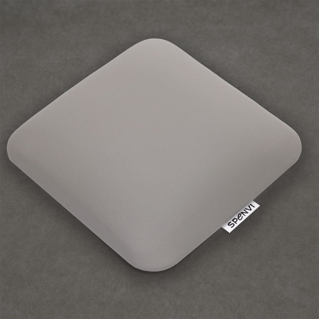 Ergonomic square SPENVI Nail Tech Elbow Cushion Mini light gray leather on a grey background, ideal for salon workstations and nail professionals. #color_cloud