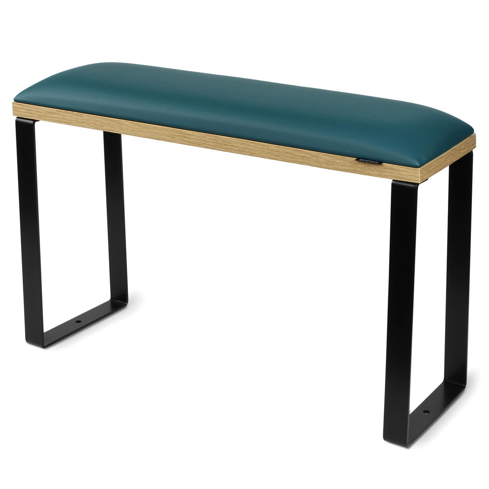 SPENVI Loft pedicure footrest with dark green leather, oak-finish base, and black metal legs on white background. #color_dark-green