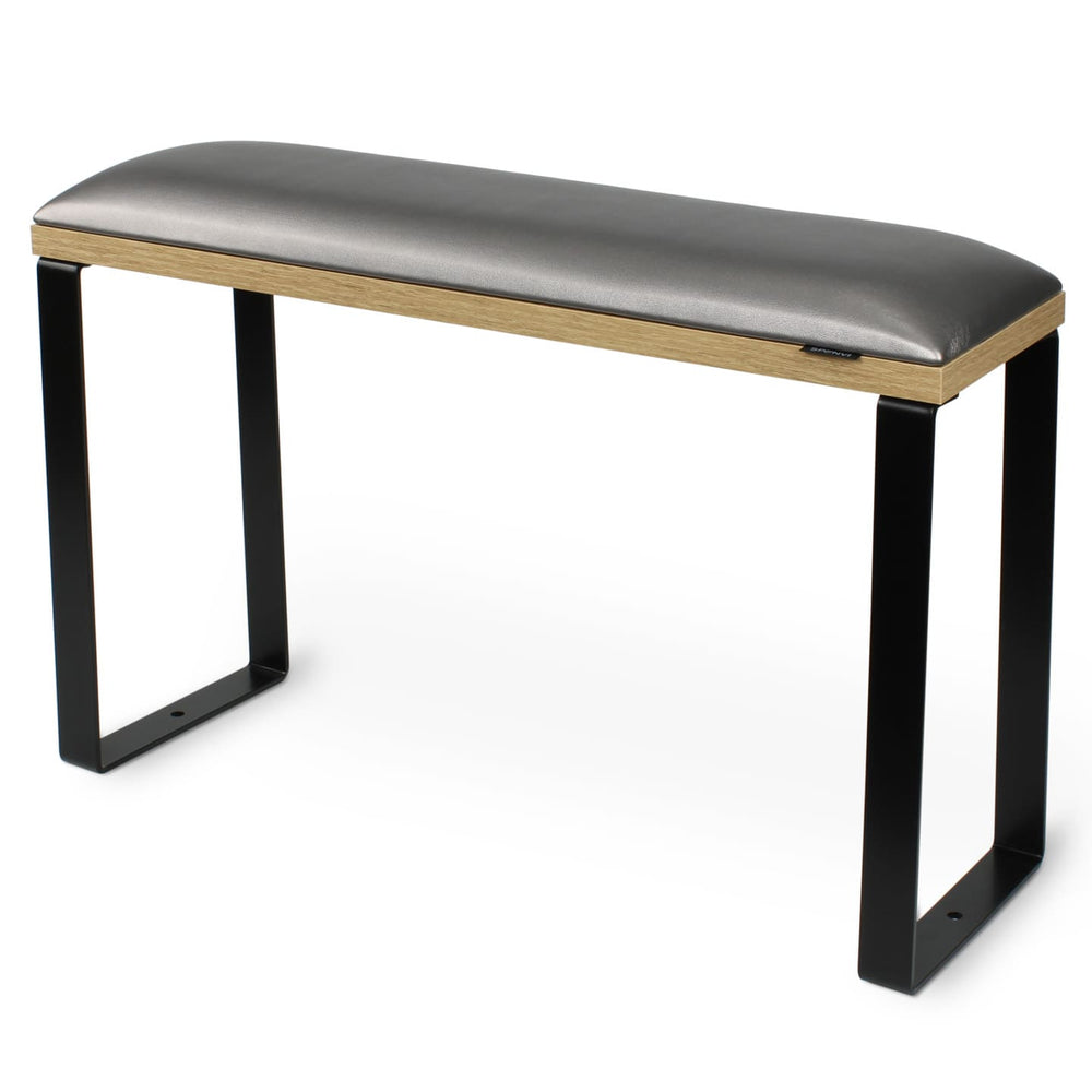 SPENVI Loft pedicure footrest with graphite leather, oak-finish base, and black metal legs on white background. #color_graphite