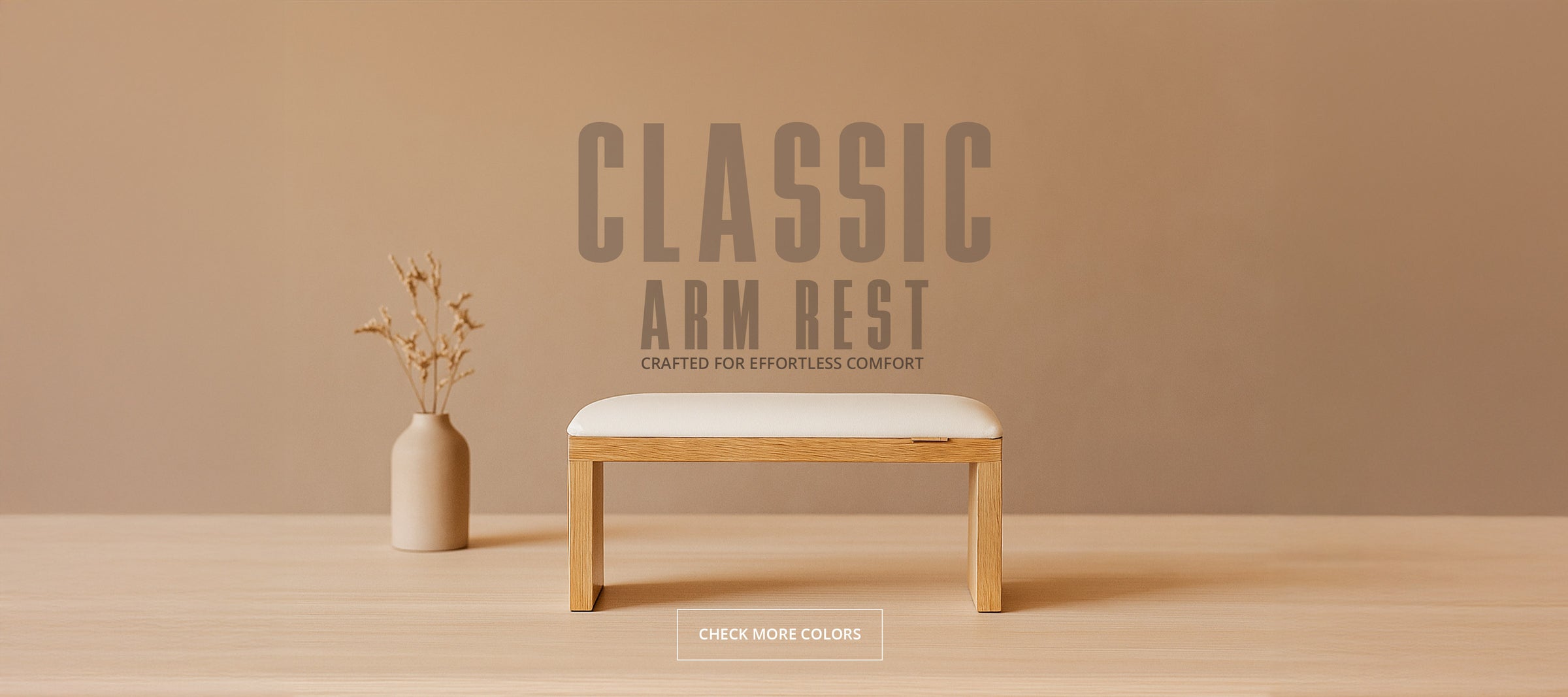 Classic manicure arm rest with a cream cushioned top and natural oak frame on a light wooden surface.